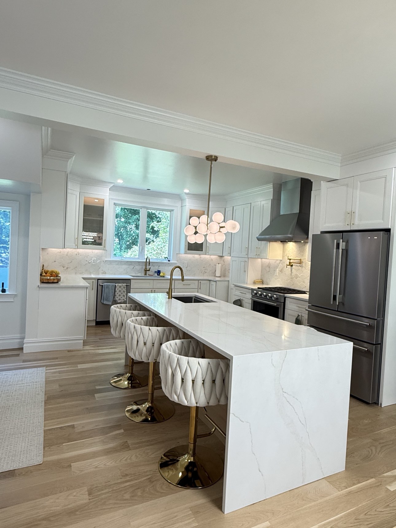 Open-concept kitchen and living area after renovation